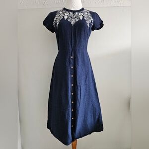 Navy dress with white lace details
